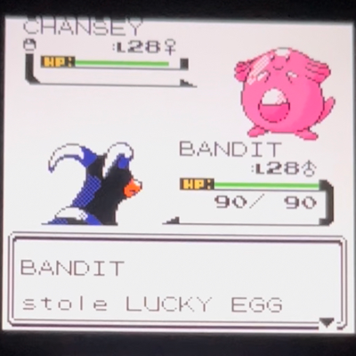 Houndoom stealing a Lucky Egg off a wild Chansey. The text box reads 'Bandit stole Lucky Egg'